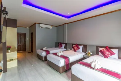 Deluxe Triple Room — Coco Bella Hotel
